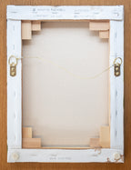 A picture of the back of Forget me Not  painting canvas with hangers and written title by Martin Buckwell