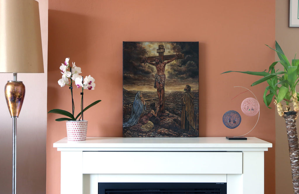 A real photograph of an original oil painting depicting the Crucifixion of Jesus Christ on Calvary in a contemporary religious realism style by Martin Buckwell