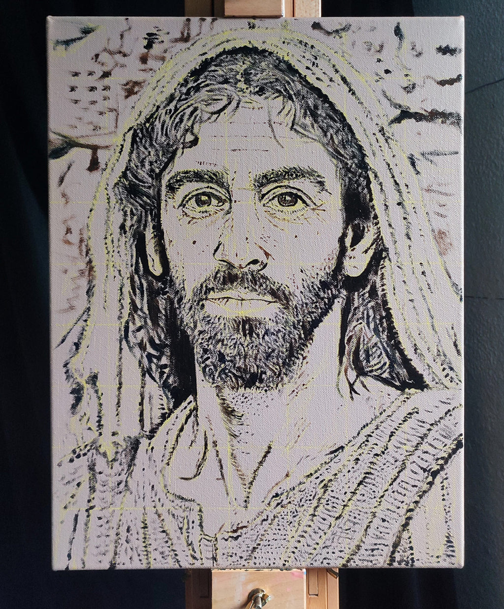 A photograph of an original oil painting of a Historically accurate Jesus portrait in its early stages by Martin Buckwell