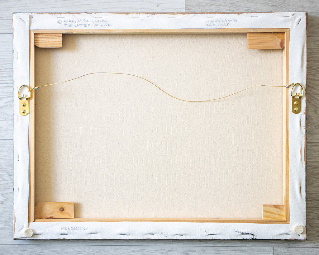 A picture of the back of The Living Water painting canvas with hangers and written title by Martin Buckwell