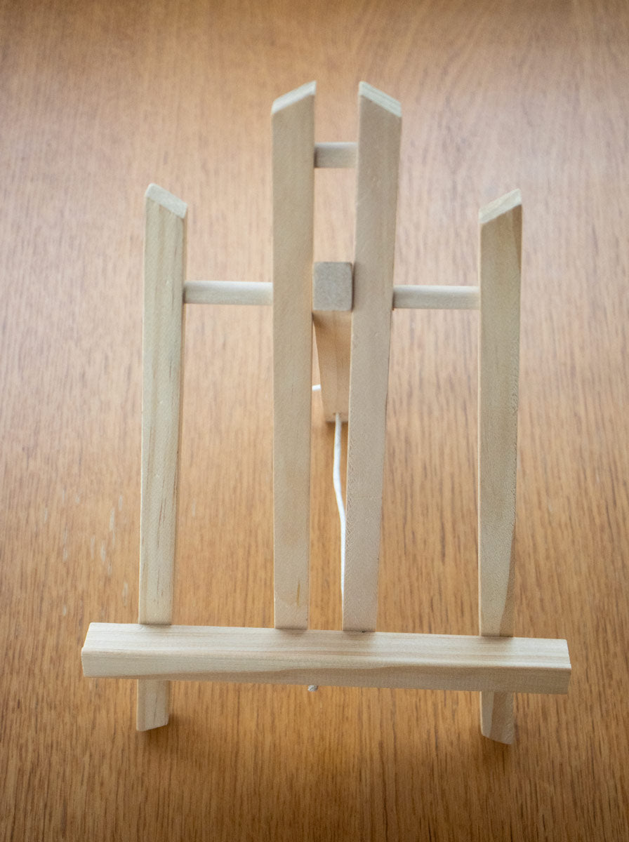 A picture of the table top easel that comes with the Tree Blossom painting, Martin Buckwell