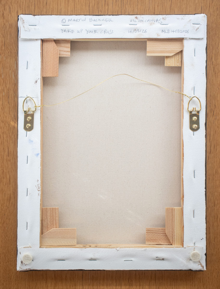 A picture of the back of Take up your cross painting canvas with hangers and written title by Martin Buckwell