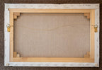 A picture of the back of Jesus Transfiguration painting canvas with hangers and written title by Martin Buckwell