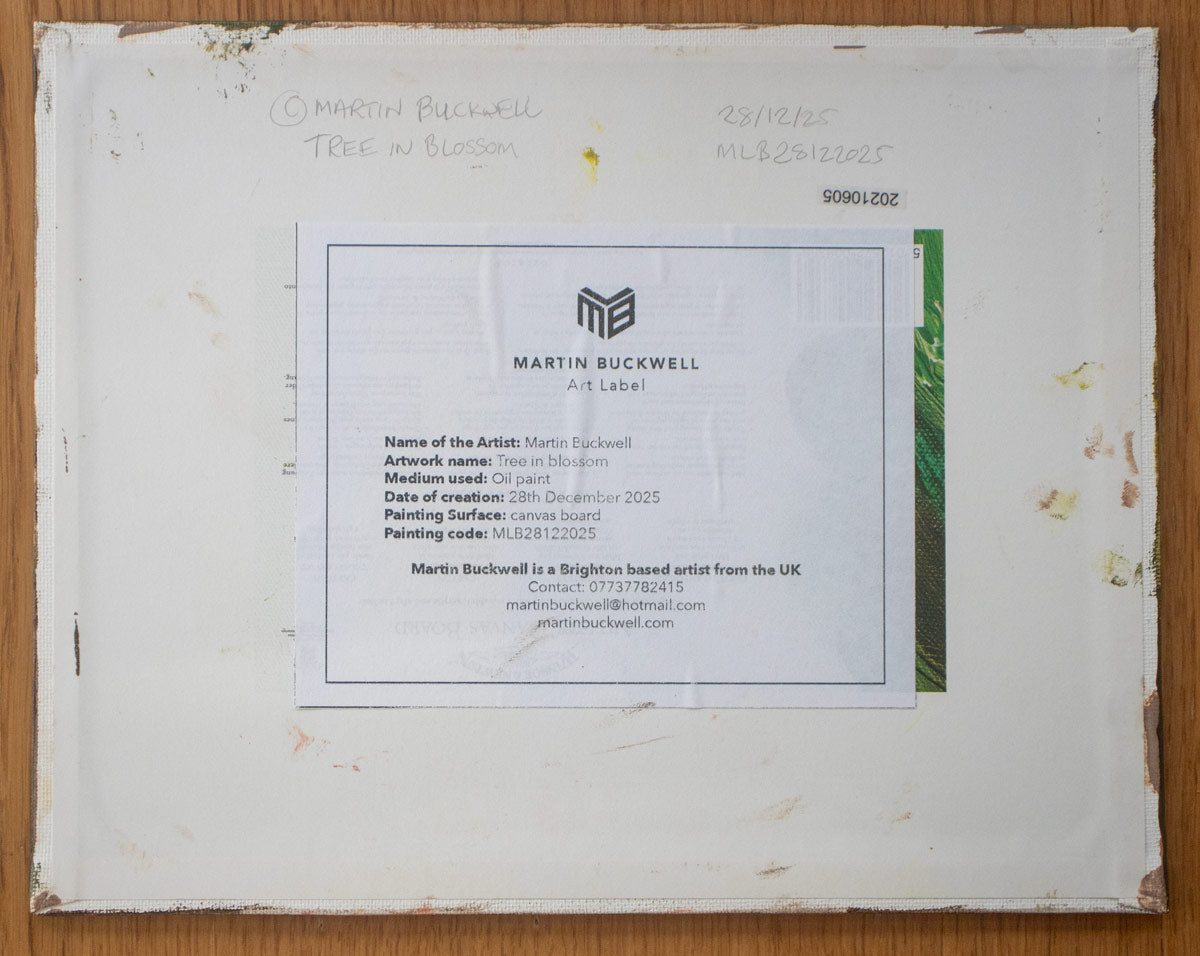 A picture of the back of Tree Blossom canvas board with sticker and title by Martin Buckwell
