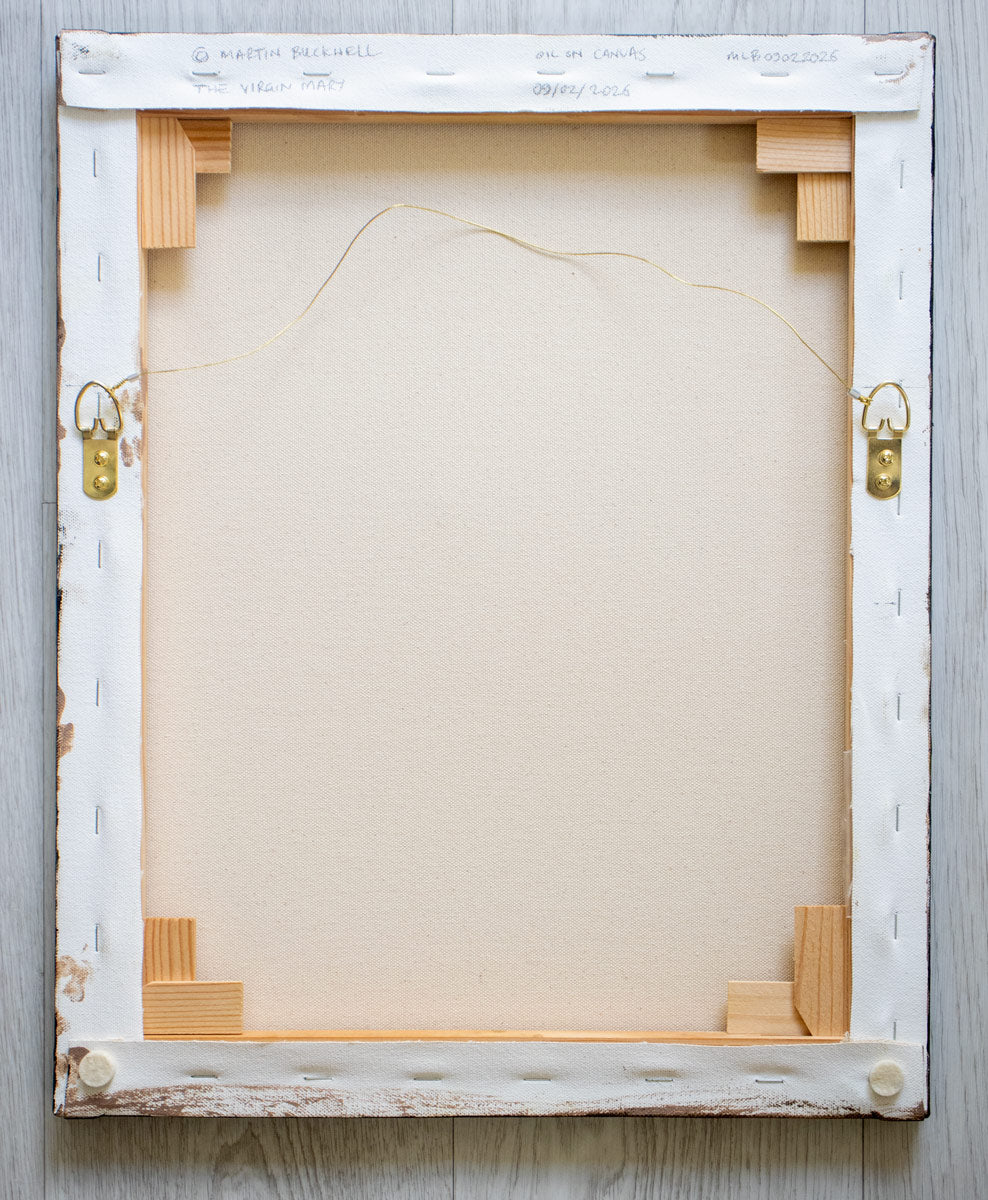 A picture of the back of The Virgin Mary painting canvas with hangers and written title by Martin Buckwell